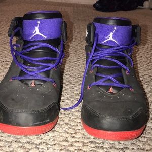 Black and purple Jordan’s
